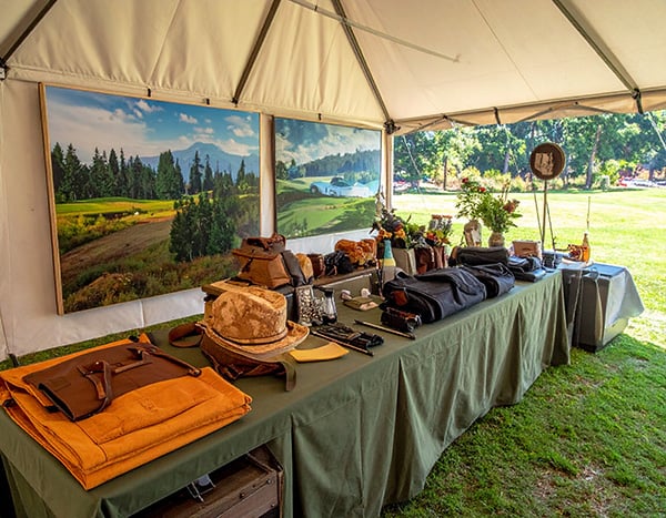 Firefly_gala silent auction table (in an enclosed tent) to include outdoor sporting items suc 359396 copy